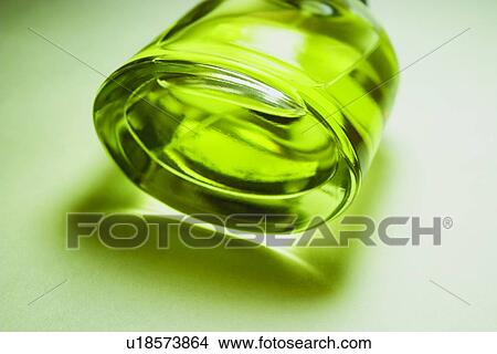 Picture - Bottle, Close-Up, Colored Background, Glass, Green. Fotosearch