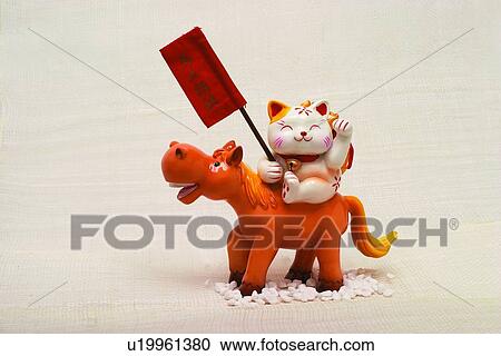 Cat, Decoration, Curio, Close-Up, Arms Raised View Large Photo Image Stock Image - Cat, Decoration, Curio, Close-Up, Arms Raised. Fotosearch