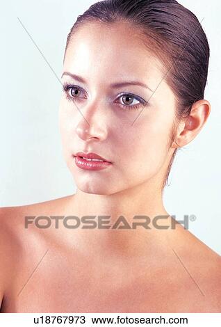 Stock Image - brown hair, attractive, posing, one woman. Fotosearch