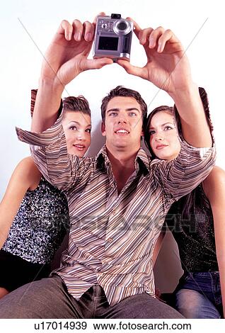 Stock Photo - brown hair, casual clothing, cheerful. Fotosearch