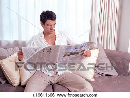 Stock Photograph - couch, male, young man, sheet, one person. Fotosearch