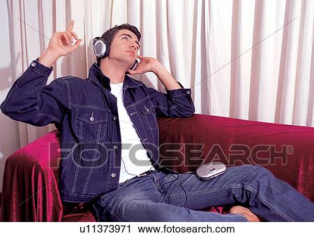 curtain, culture, cd player, home interior, indoor, male, young man View Large Photo Image Stock Image - curtain, culture, cd player, home interior, indoor, male, young man. Fotosearch