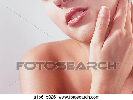 Stock Photograph - facial, radiant, beautifying, one woman, close-up. Fotosearch