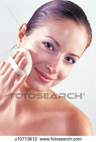 Stock Image - indoor, lipstick, beautifying, beautiful, powder puff, shadow, cosmetic. Fotosearch