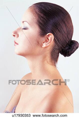 Stock Image - lipstick, one woman, white background, young, mascara. Fotosearch