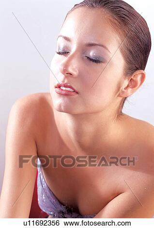 makeup, lipstick, bikini, glowing View Large Photo Image Stock Photograph - makeup, lipstick, bikini, glowing. Fotosearch