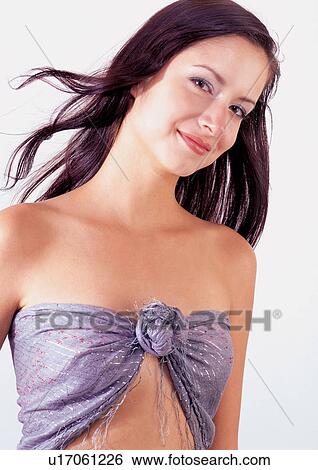 Stock Photograph - model, waist up, dress, looking at camera, female, lipstick. Fotosearch