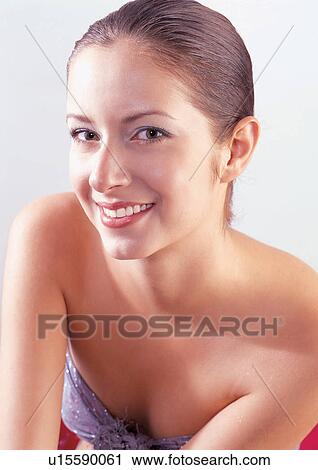young woman, smiling, glowing, attractive, brown hair, radiant, makeup View Large Photo Image Stock Image - young woman, smiling, glowing, attractive, brown hair, radiant, makeup. Fotosearch