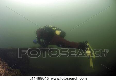Diver on British Blockship Ilsenstein, Scapa Flow, Orkney islands, Scotland, UK View Large Photo Image Stock Photography - Diver on British Blockship Ilsenstein, Scapa Flow, Orkney islands, Scotland, UK. Fotosearch