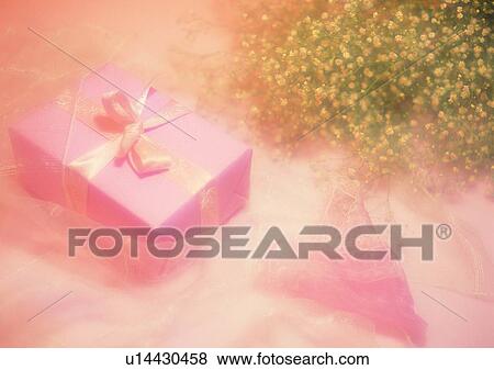 Stock Photo - gift, ribbon, flower, pink, paper. Fotosearch