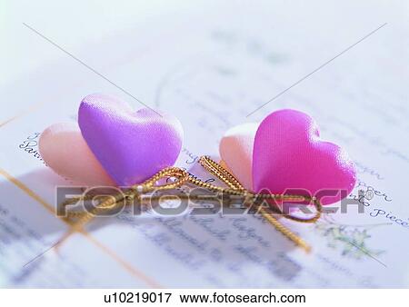 Stock Photo - heart shaped, bow, paper, letter, pink, love. Fotosearch