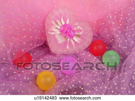 Stock Image - heart shaped, flower, ball, spot, red. Fotosearch
