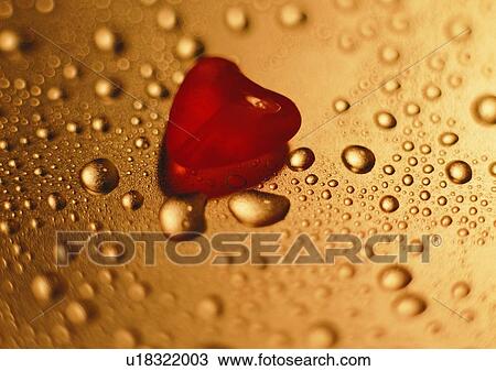 Stock Image - reflection, love, heart shaped, plastic, red, water drop. Fotosearch