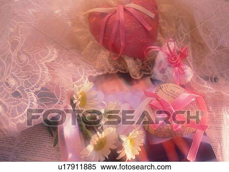Stock Photography - ribbon, flower, newspaper, gift, love. Fotosearch