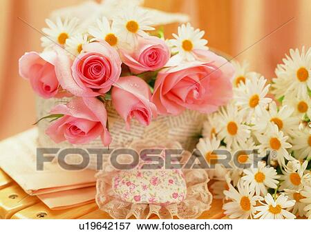 rose, daisy, heart shaped, newspaper, table View Large Photo Image Stock Photo - rose, daisy, heart shaped, newspaper, table. Fotosearch