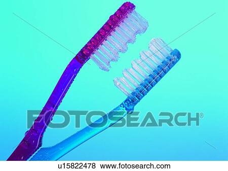 Stock Photo - toothbrush, red, water drop, shaped, blue, background. Fotosearch