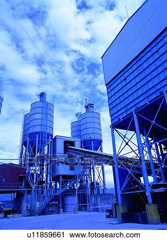 Stock Image - Building, Chute, Container, Cylindrical, Day. Fotosearch