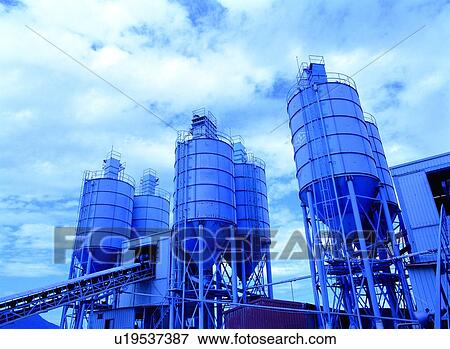 Stock Photo - Building, Chute, Container, Cylindrical, Day. Fotosearch