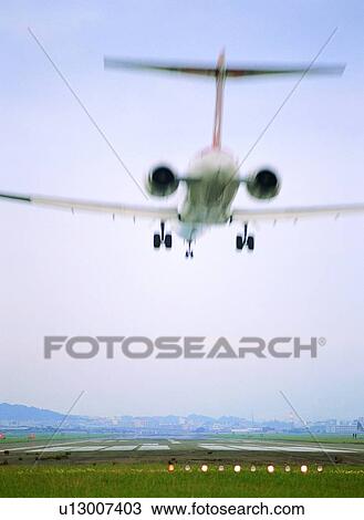 Stock Image - Machinery, Landing, Runway, Day, Airplane. Fotosearch