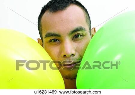 Balloon, Expressions, Close-Up, Asian Ethnicity View Large Photo Image Stock Photo - Balloon, Expressions, Close-Up, Asian Ethnicity. Fotosearch