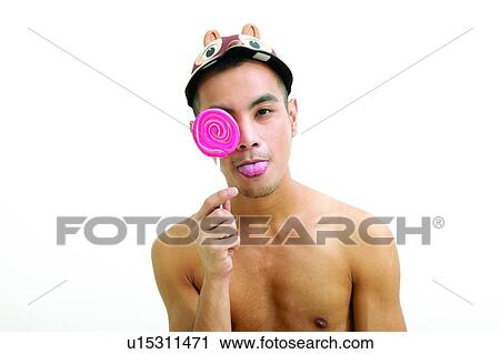 Bare Chest, Cap, Candy, Asian Ethnicity View Large Photo Image Stock Image - Bare Chest, Cap, Candy, Asian Ethnicity. Fotosearch