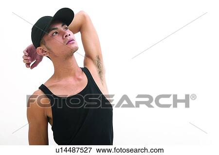 Stock Photo - Dreams, Hands Behind Head, Casual Clothing. Fotosearch
