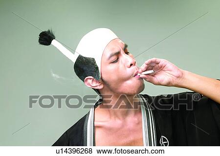 Eyes Closed, Young Adult, Retro Revival, One Young Man Only, Tobacco Product, Head And Shoulders View Large Photo Image Stock Photo - Eyes Closed, Young Adult, Retro Revival, One Young Man Only, Tobacco Product, Head And Shoulders. Fotosearch