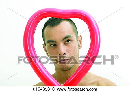 Lifestyles, Heart Shape, Looking At Camera, Thinking, Head And Shoulders, One Person, Contemplation View Large Photo Image Stock Image - Lifestyles, Heart Shape, Looking At Camera, Thinking, Head And Shoulders, One Person, Contemplation. Fotosearch