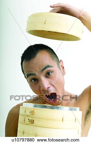 Looking At Camera, Mouth Open, One Young Man Only, Holding, Men View Large Photo Image Stock Image - Looking At Camera, Mouth Open, One Young Man Only, Holding, Men. Fotosearch