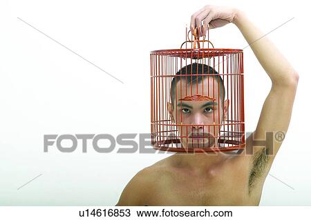 Men, Cage, Standing, One Person, Problems View Large Photo Image Stock Image - Men, Cage, Standing, One Person, Problems. Fotosearch