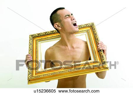 Stock Photography - Men Expressions, Effort, Frame, Framework, Men, Young Adult, One Young Man Only. Fotosearch
