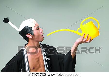 Stock Image - Men Expressions, Eyes Closed, Asian Ethnicity, Leisure Activity, Indoor. Fotosearch
