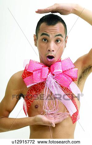 Stock Image - Portrait, Asian Ethnicity, White Background, Indoor, Individuality, Posing, Bow. Fotosearch