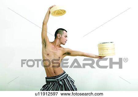 Stock Photo - Waist-Up, Hand Raised, Receding Hairline, Men Expressions, Lifestyles. Fotosearch
