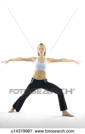 Stock Photo - Portrait of a young woman practicing yoga. Fotosearch