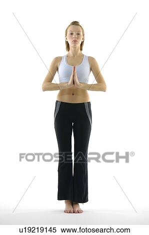 Portrait of a young woman practicing yoga View Large Photo Image Stock Photography - Portrait of a young woman practicing yoga. Fotosearch