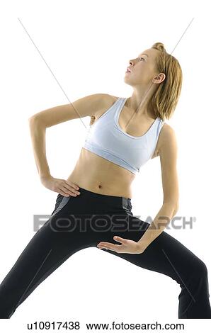 Young woman practicing yoga View Large Photo Image Stock Photo - Young woman practicing yoga. Fotosearch