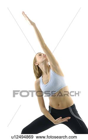 Stock Photo - Young woman practicing yoga. Fotosearch