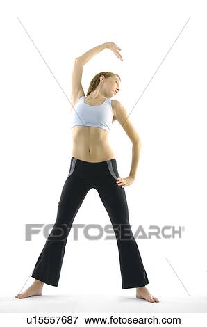 Young woman practicing yoga View Large Photo Image Stock Photo - Young woman practicing yoga. Fotosearch