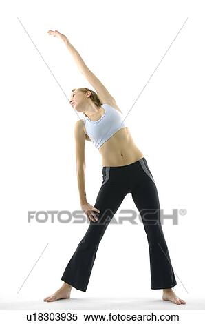 Young woman practicing yoga View Large Photo Image Stock Photography - Young woman practicing yoga. Fotosearch
