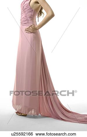 Low section view of a fashion model posing View Large Photo Image Stock Photograph - Low section view of a fashion model posing. Fotosearch