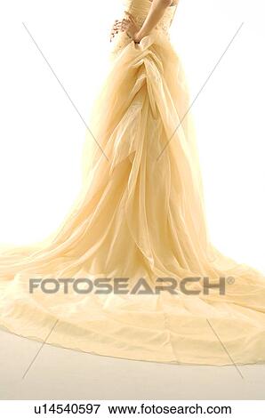 Stock Photo - Low section view of a woman standing. Fotosearch