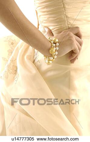Stock Photography - Mid section view of a woman posing. Fotosearch