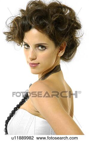 Portrait of a young woman posing View Large Photo Image Stock Image - Portrait of a young woman posing. Fotosearch