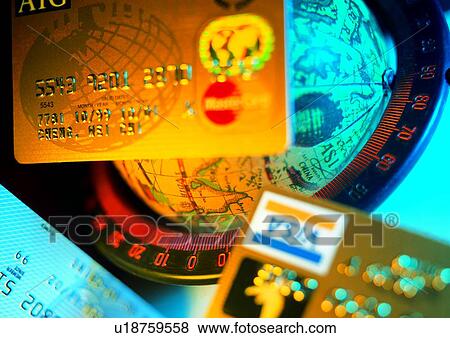 Stock Photo - credit card, shadow, cash, light, money, ruler. Fotosearch