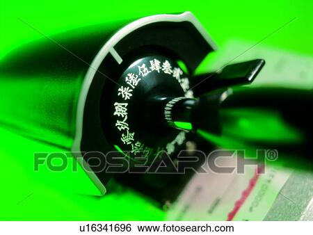 Stock Photograph - indoor, cash, machine, money, light, shadow. Fotosearch