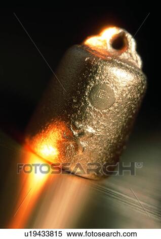 Stock Photography - indoor, money, cash, gold, light, reflection. Fotosearch