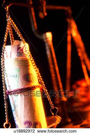 Stock Image - indoor, money, cash, light, shadow, Chinese steelyard. Fotosearch