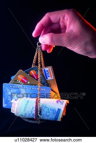 Stock Photo - indoor, money, cash, light, shadow, Chinese steelyard. Fotosearch