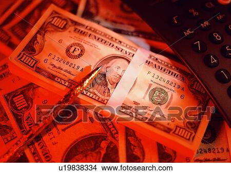Picture - indoor, money, cash, pen, calculater, light. Fotosearch
